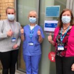 Dr Anna, Mandy and Amy wearing masks and with their thumbs up